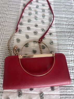 Elegant Red Crossbody Bag with Gold Ring Detail